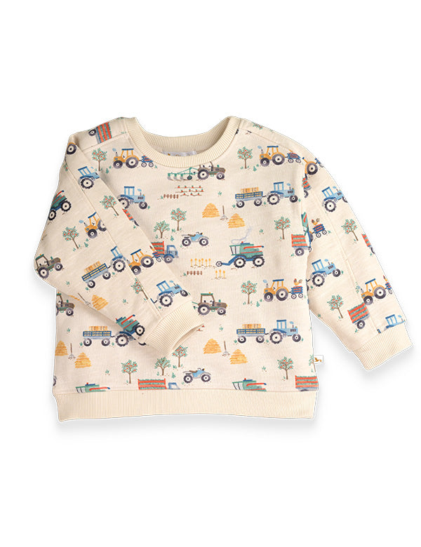 Cream kids sweatshirt with colorful tractor and farm print, featuring trees and hay bales design