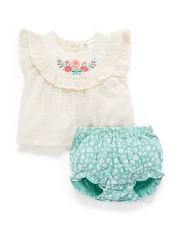 Organic cotton baby girl outfit with cream ruffle top embroidered with pink flowers and mint green floral bloomers