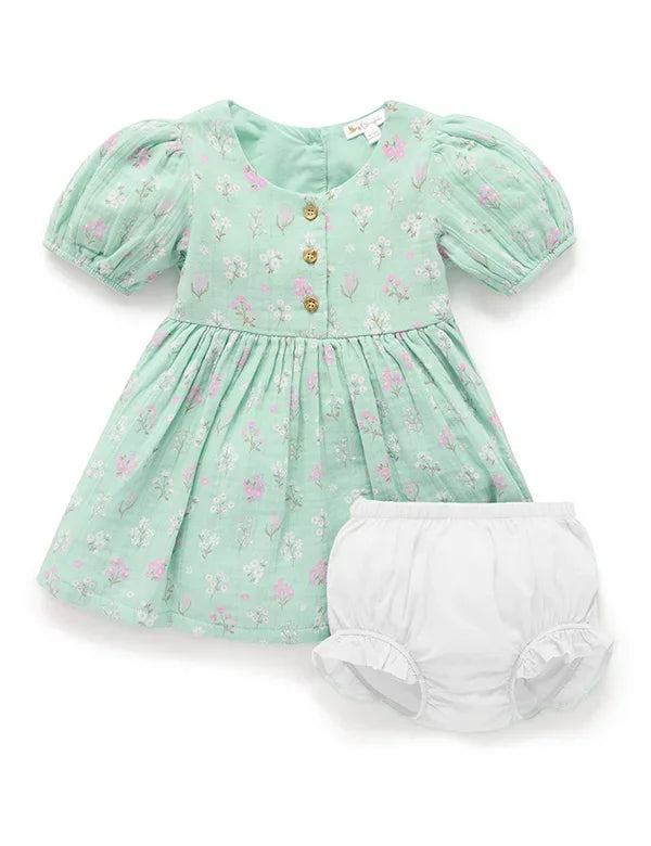 Seafoam green floral printed baby dress with puff sleeves and matching white bloomers