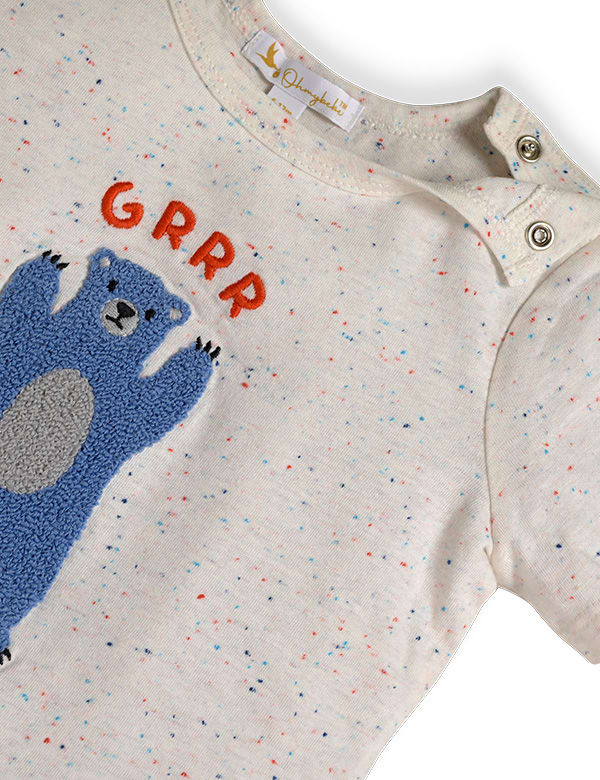 Cream toddler T-shirt with speckled pattern, blue bear applique and red GRRR text, shoulder snap buttons