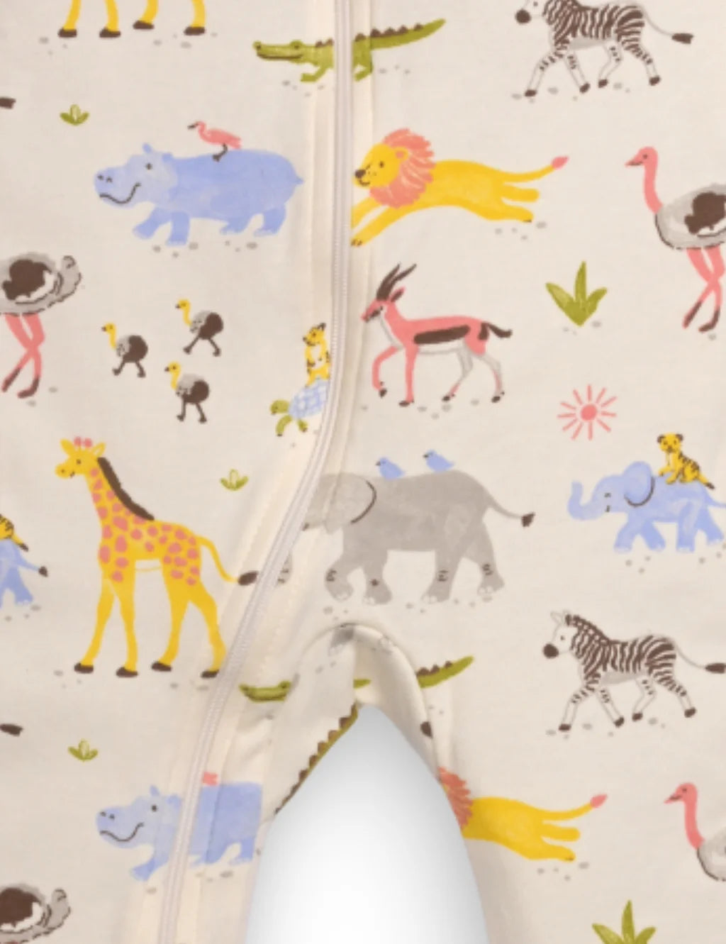 Baby onesie with animal pattern on a plain background
