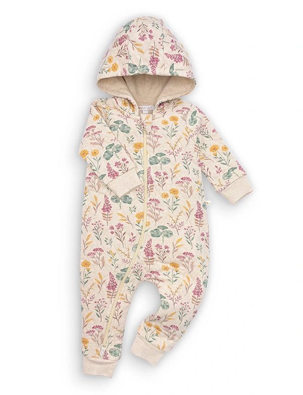 Baby hooded onesie with zipper, cream fabric featuring colorful floral and leaf pattern