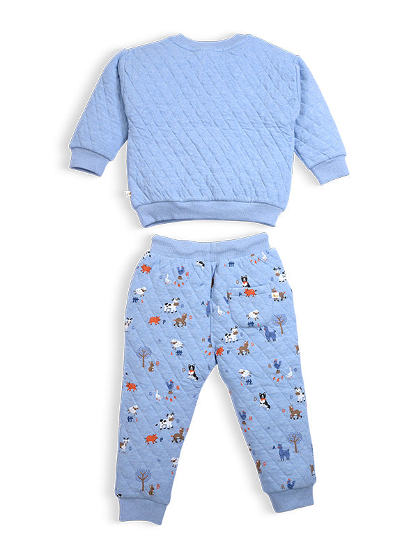 Blue quilted baby outfit with long-sleeve top and pants featuring colorful animal prints