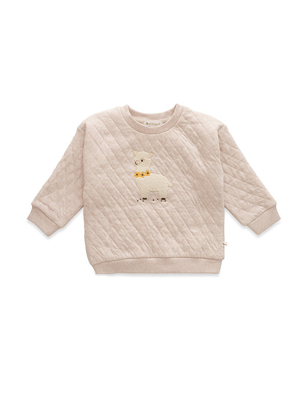Beige quilted baby sweatshirt with embroidered llama and yellow flowers on front