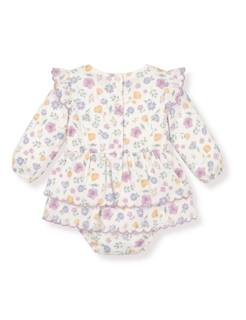 Back flatlay view of a baby girl floral tiered dress romper featuring purple scalloped edges and button closure