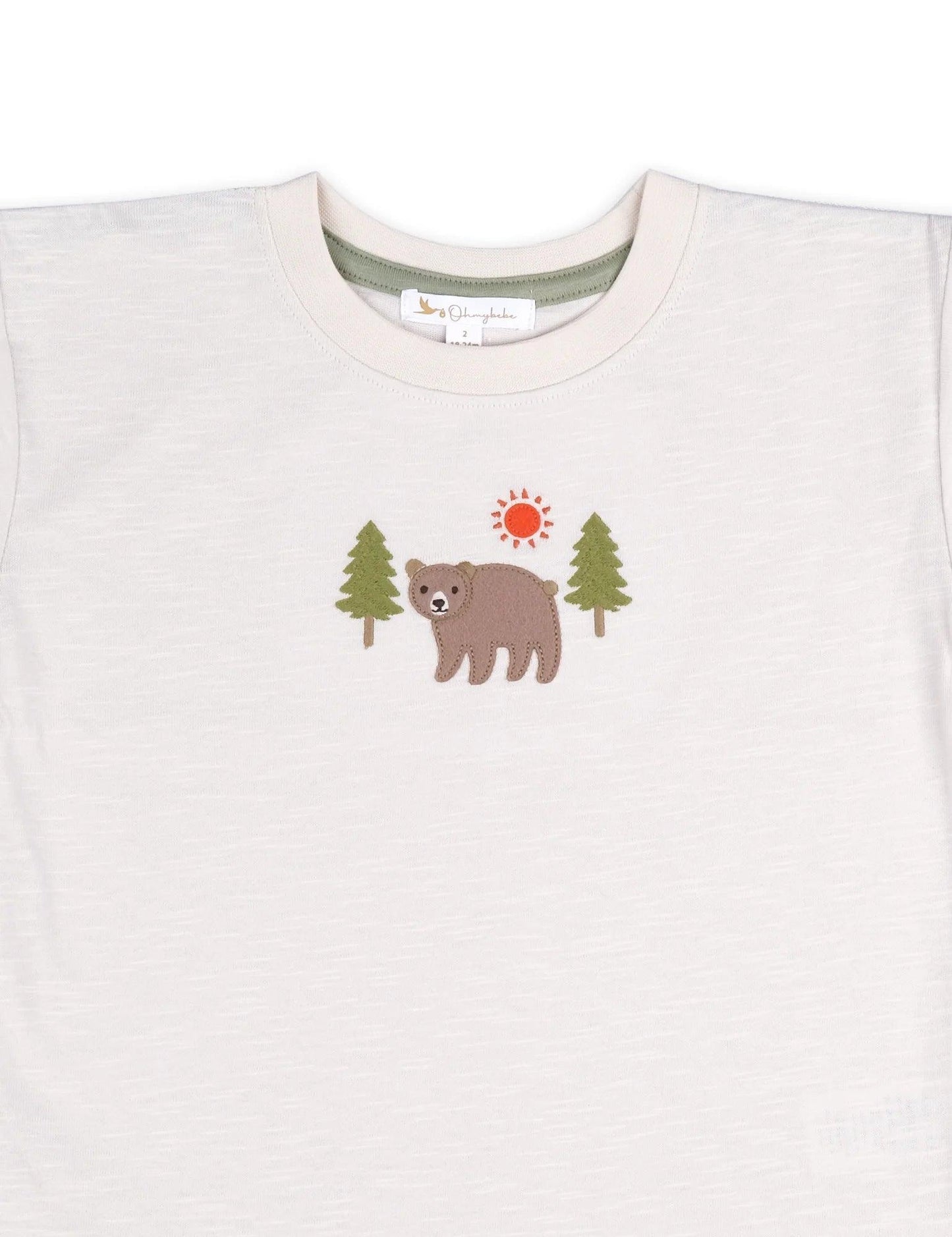 Organic cotton baby t-shirt with bear applique and green trees under red sun