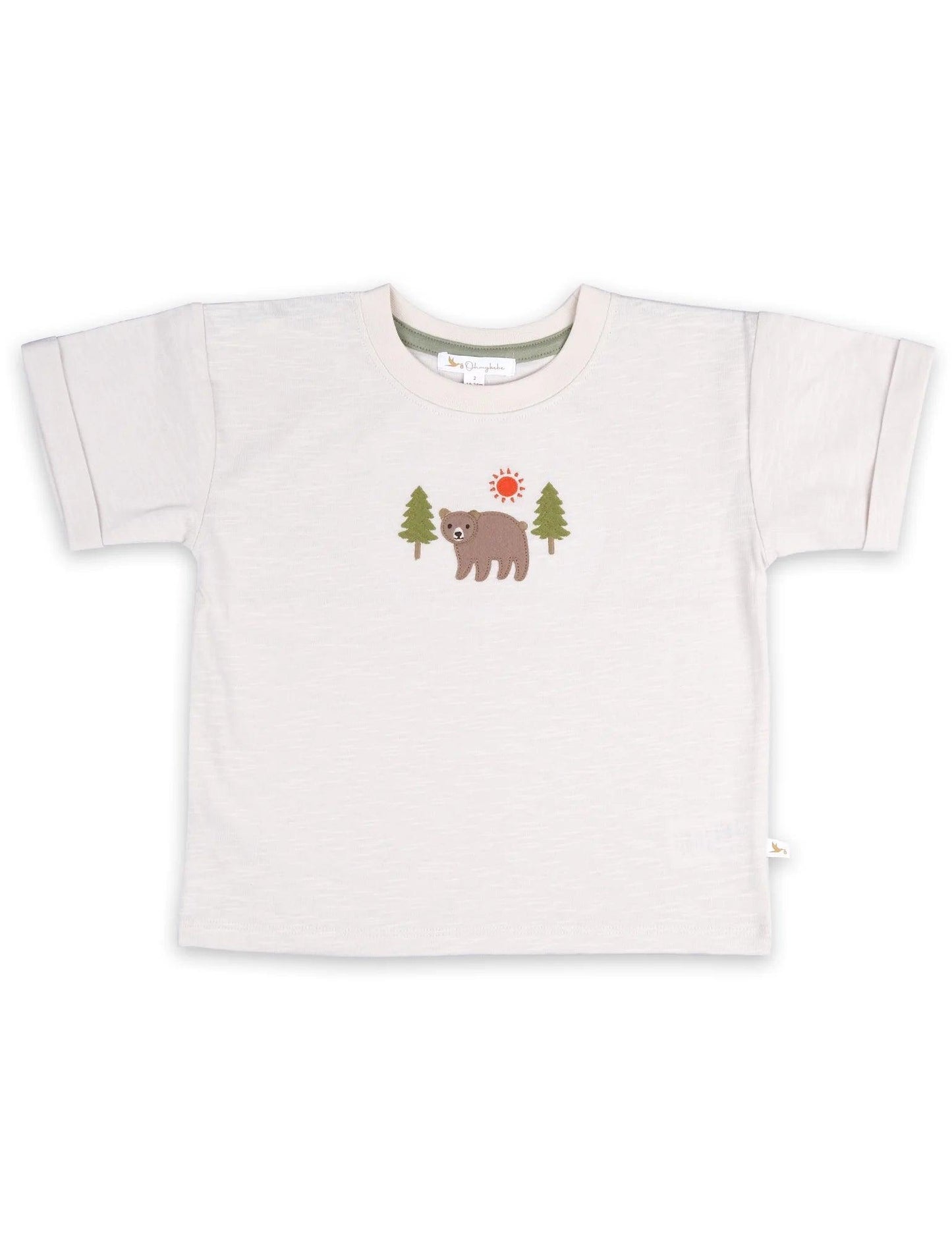 Organic cotton baby t-shirt with bear applique, trees, and sun design in soft cream color