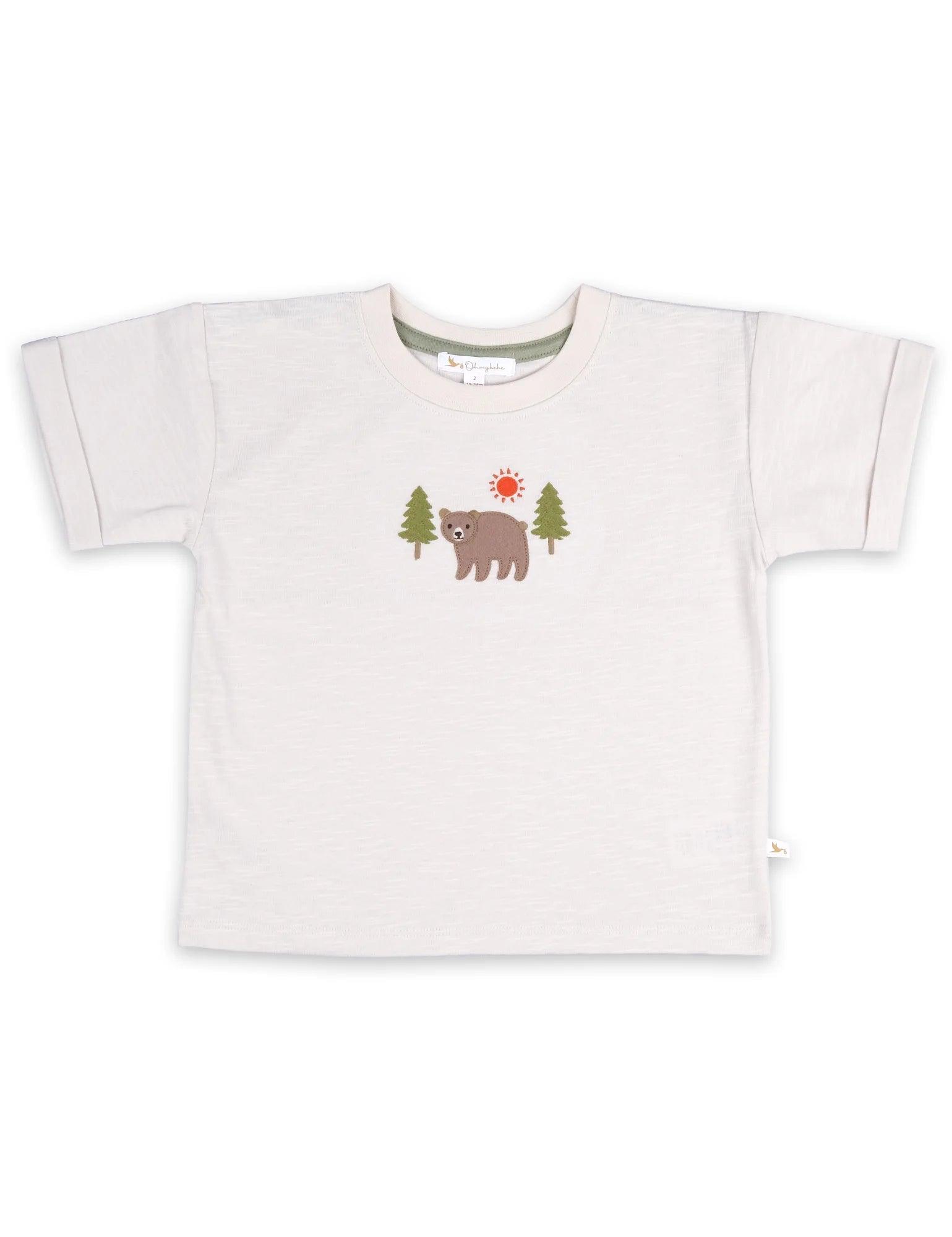 Organic cotton baby t-shirt with bear applique, trees, and sun design in soft cream color