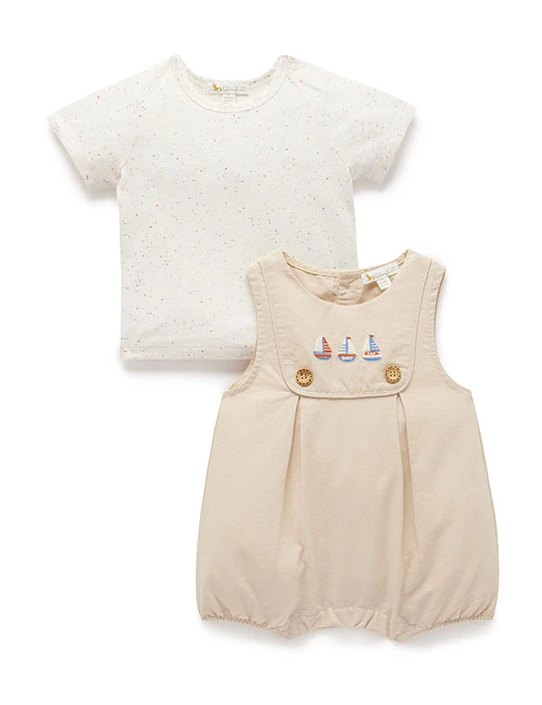 Beige baby romper with sailboat embroidery and white speckled short sleeve shirt set