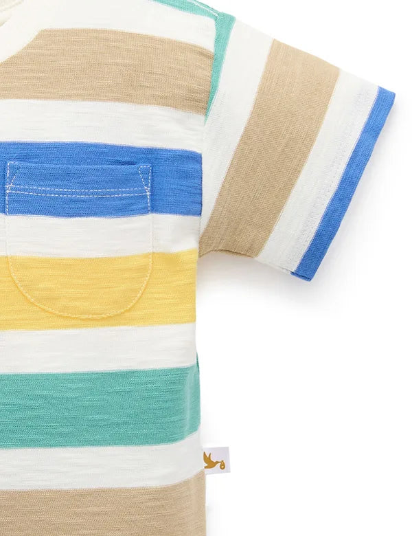 Close-up of a striped short-sleeve shirt with beige, blue, yellow, green, and white horizontal stripes and a blue chest pocket