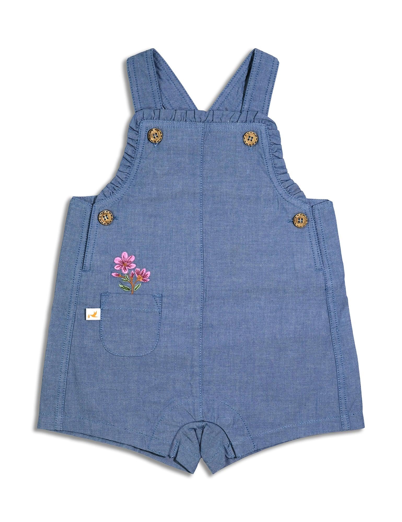 blue denim baby dungaree with pink floral embroidery and wooden buttons