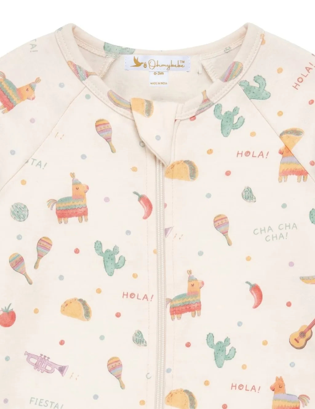 Close-up detail of a cream zip-up baby romper featuring a fiesta print with piñatas, maracas, and a zipper guard.