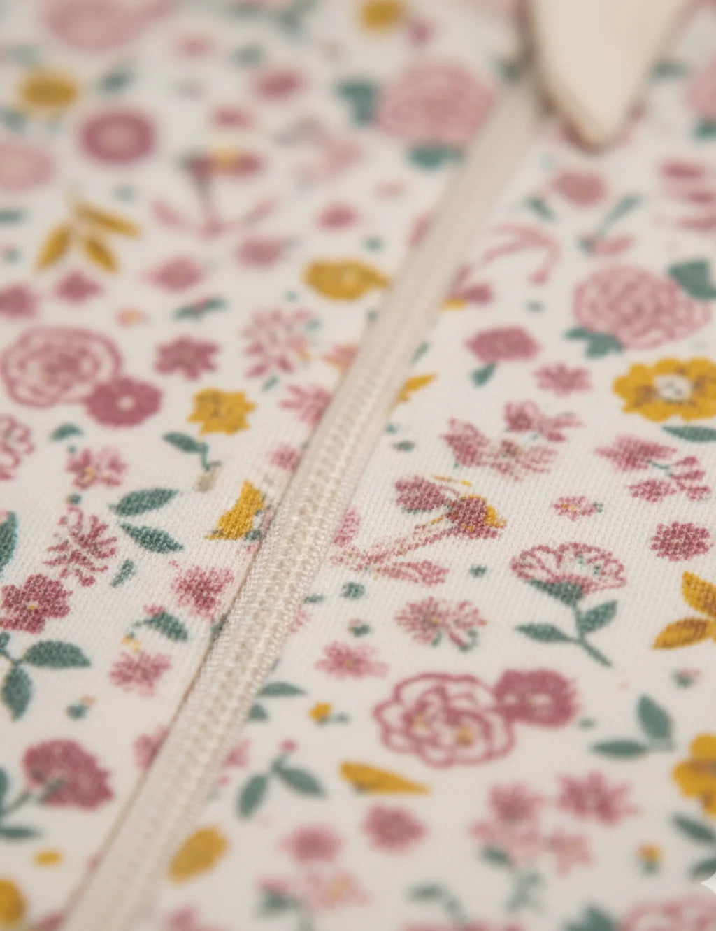 Floral fabric with a zipper running through it