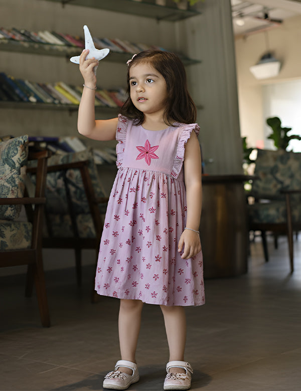 Lavender floral baby girl dress made from soft organic cotton double muslin  