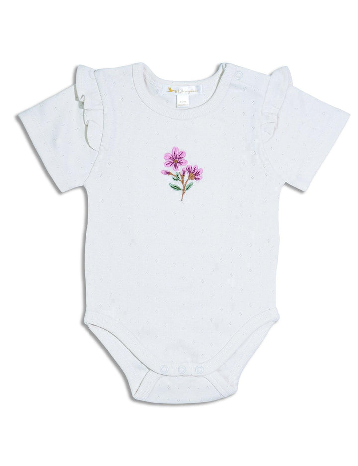  White baby bodysuit with short flutter sleeves and a delicate pink and purple floral embroidery on the chest. Shop gentle baby bodysuits India.