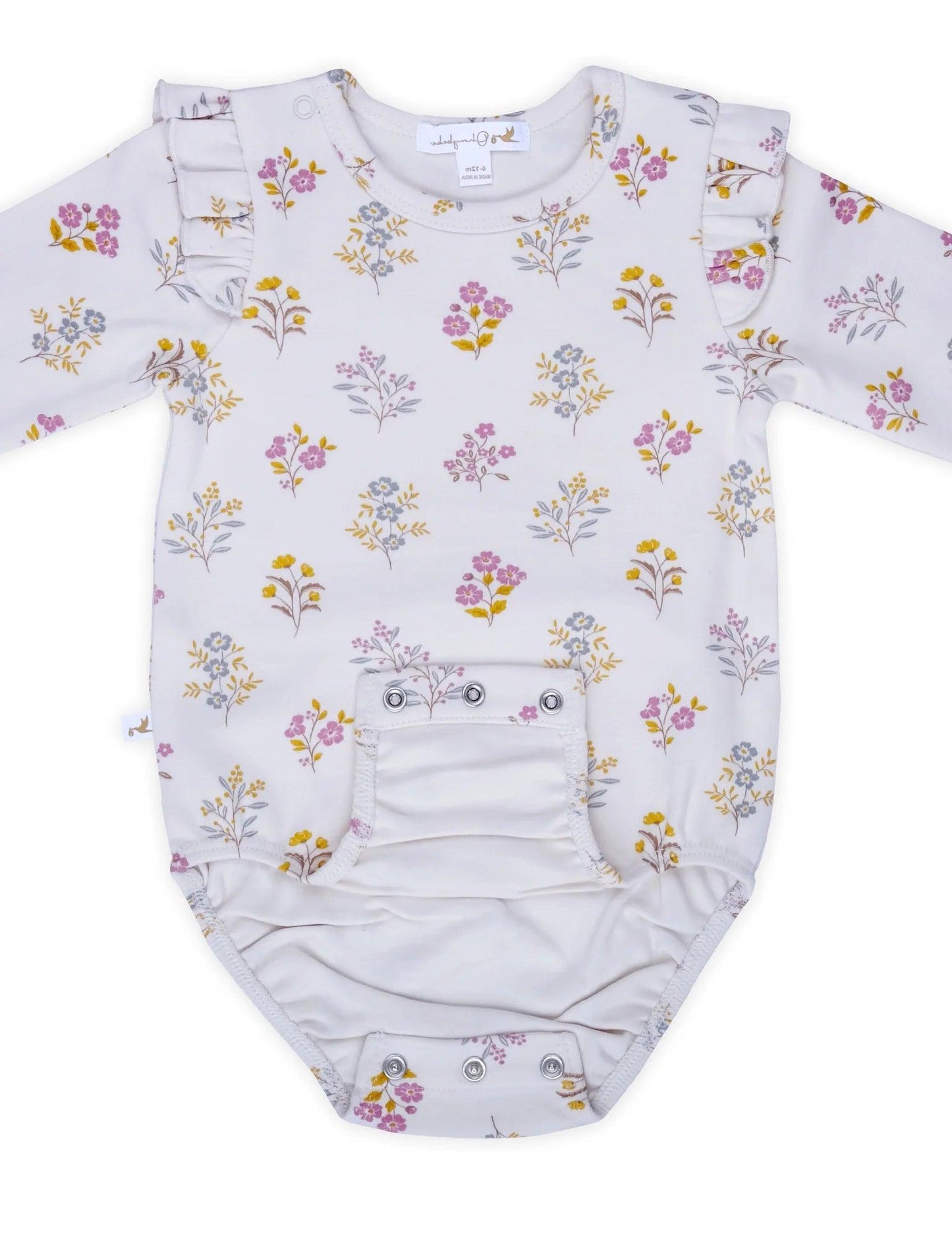 White organic cotton baby bodysuit with yellow, pink, and blue floral print and ruffle sleeves