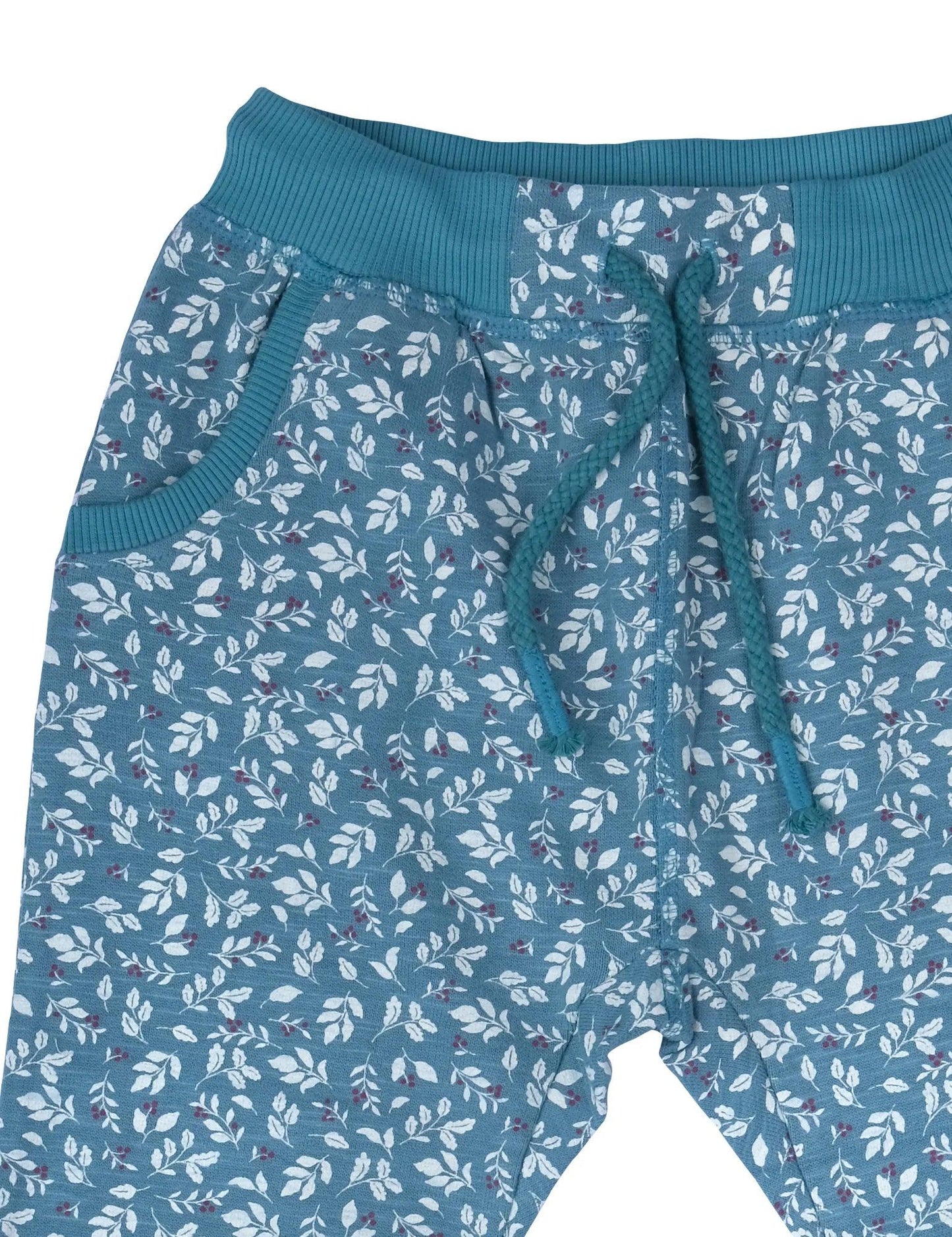 Blue organic cotton baby pants with white floral print and teal ribbed waistband and drawstring