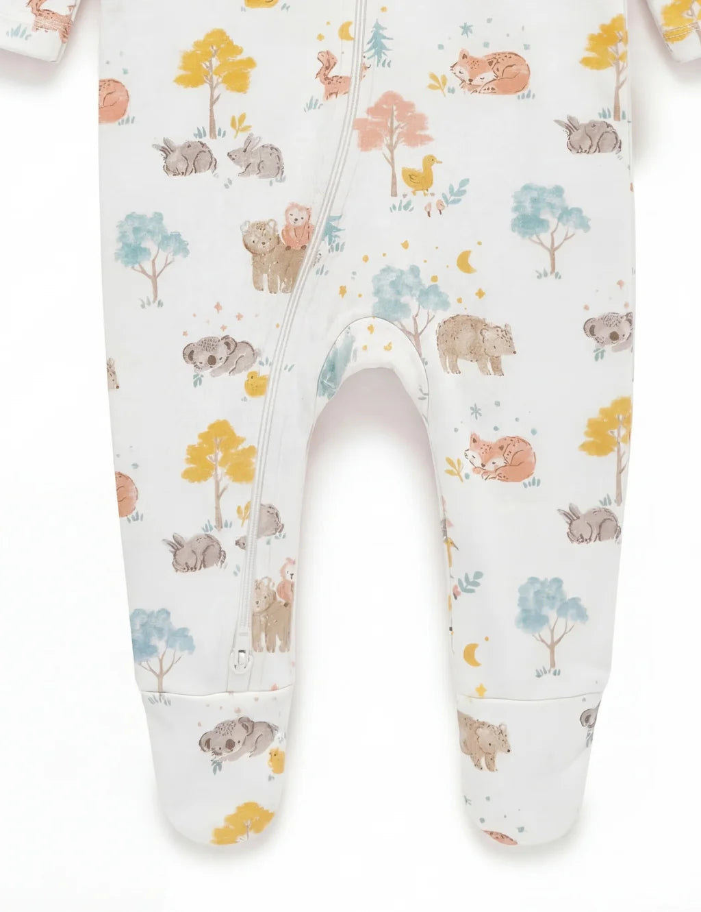 Close-up of the footed legs on an organic cotton baby zipper romper with sleeping animals.