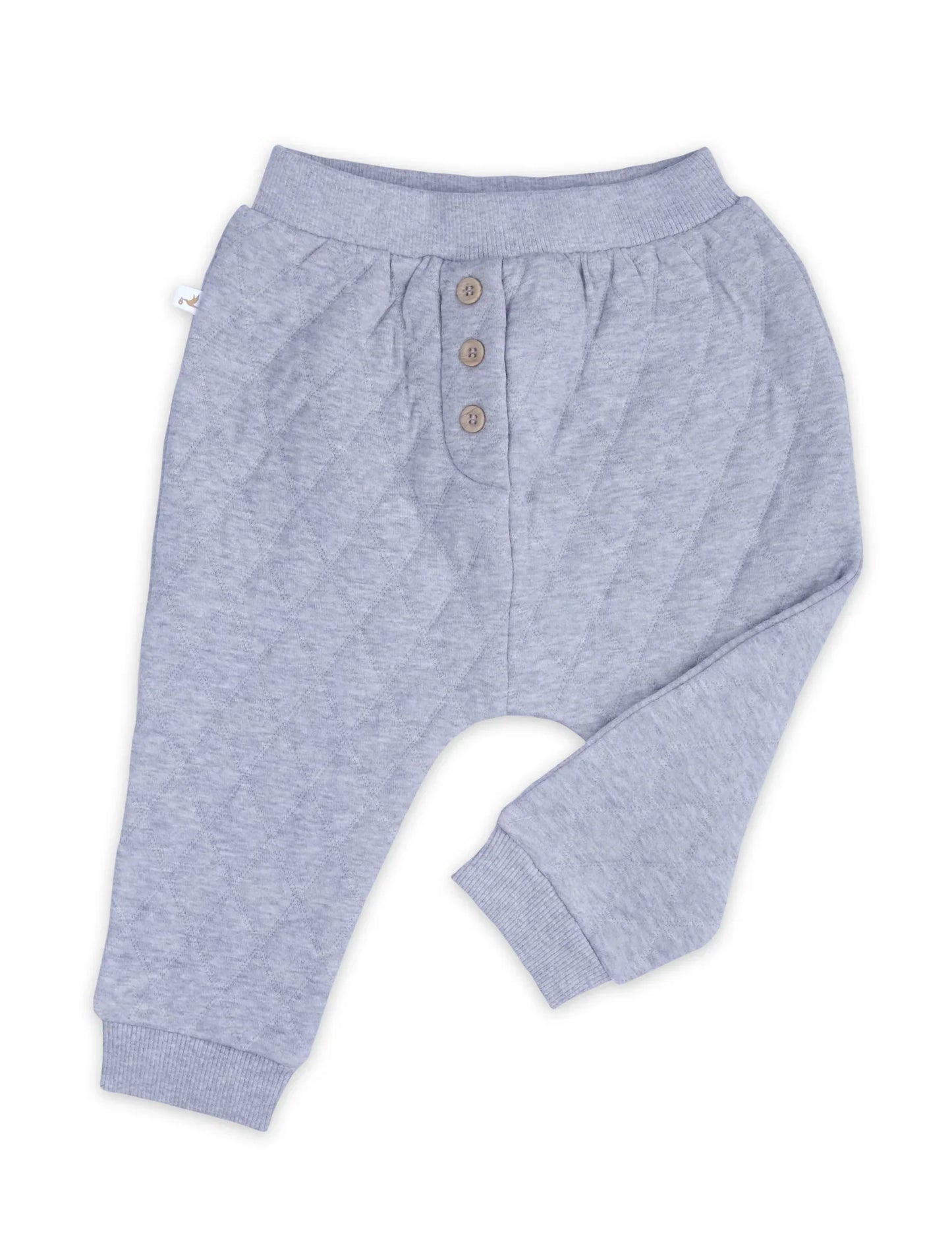 Grey quilted slouchy track pants with ribbed cuffs and button detail on white background