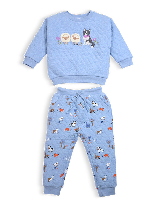 Blue quilted toddler outfit with sweatshirt featuring sheep and dog embroidery and matching animal print pants