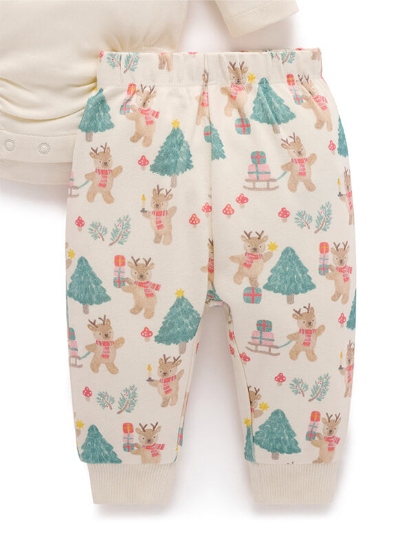 Children's pants with Christmas-themed pattern on a white background