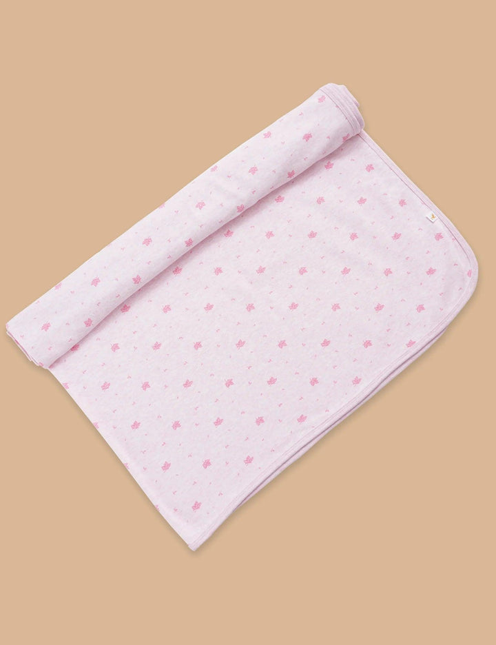 Lightweight and breathable pink organic cotton muslin swaddle blanket featuring a subtle all-over maple leaf design. Buy soft baby swaddles online India.