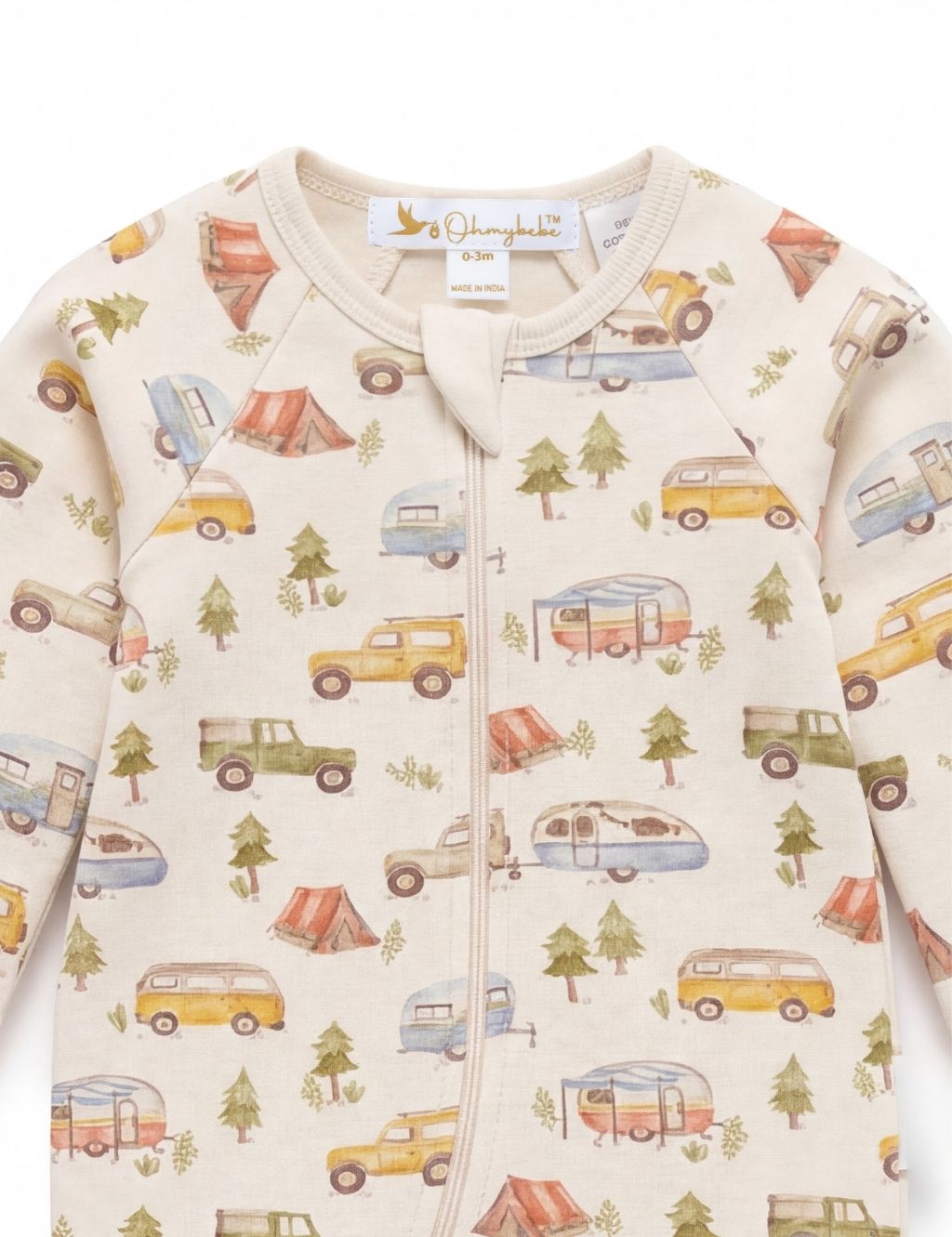 Close-up of the neckline and zipper on a cream organic cotton baby romper with a camping print