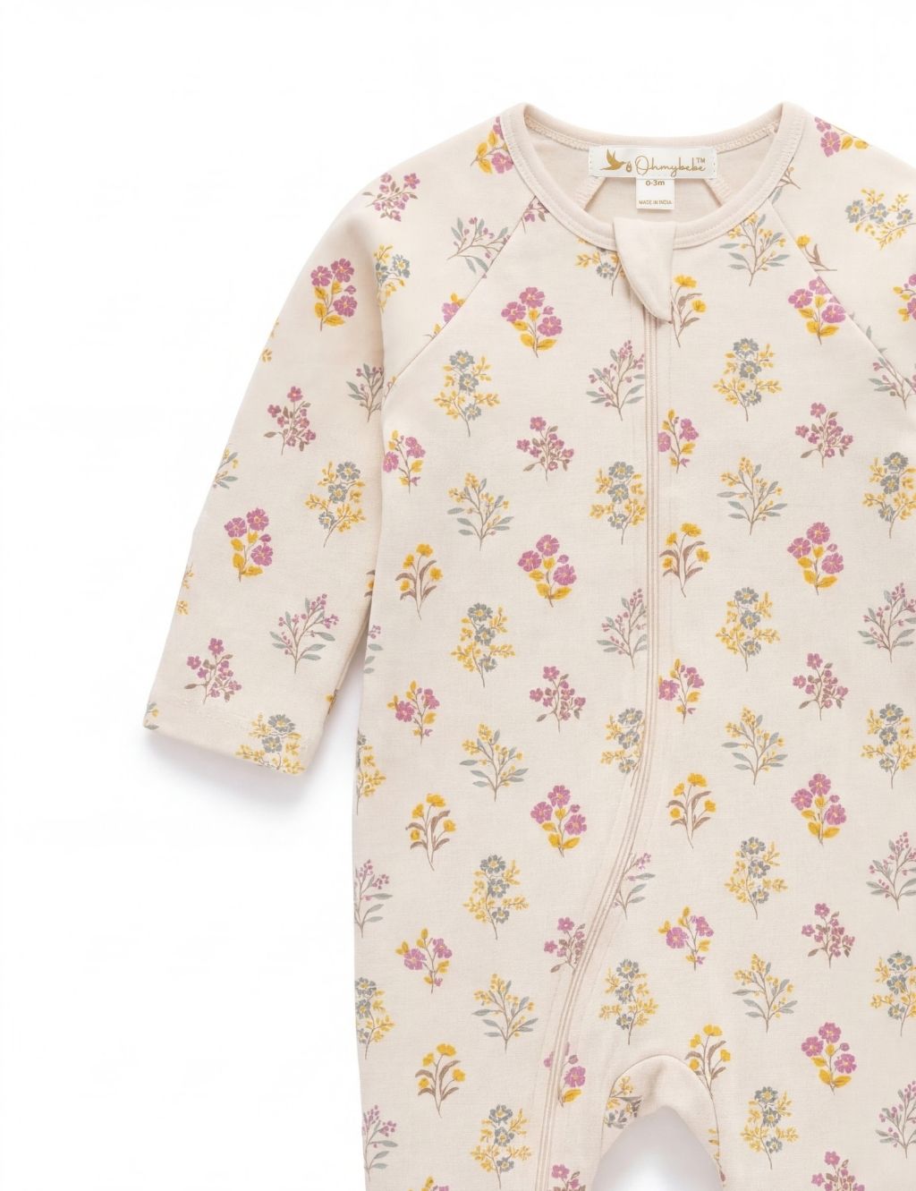 lose-up of the neckline and zipper on an organic cotton posie floral baby romper.