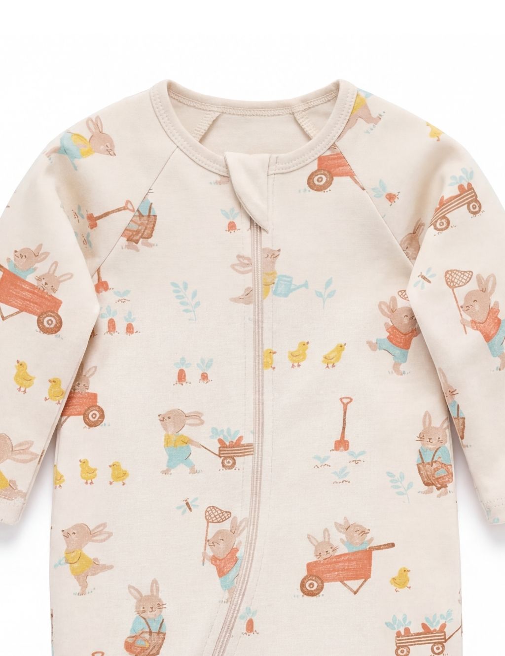 Close-up of the neckline and zipper on an organic cotton Easter bunny baby romper.
