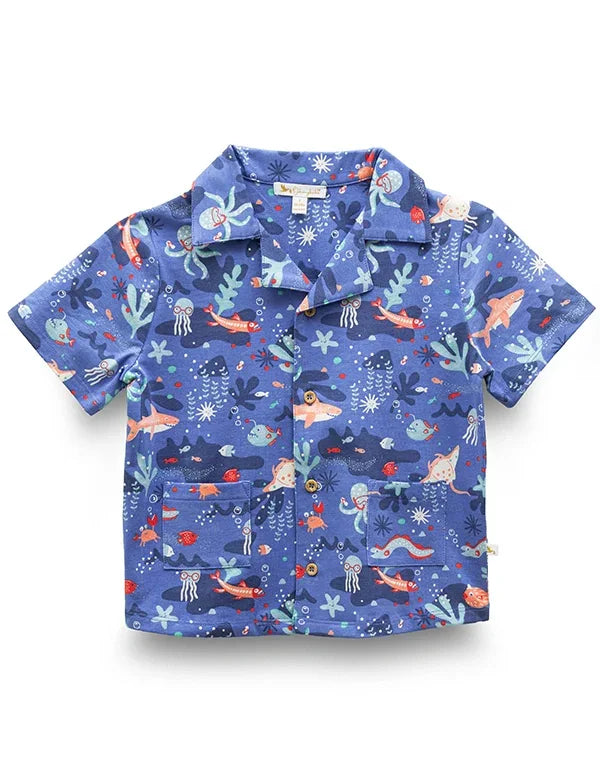 Blue short-sleeve kids shirt with colorful ocean sea life print including fish, octopus, jellyfish, and seaweed