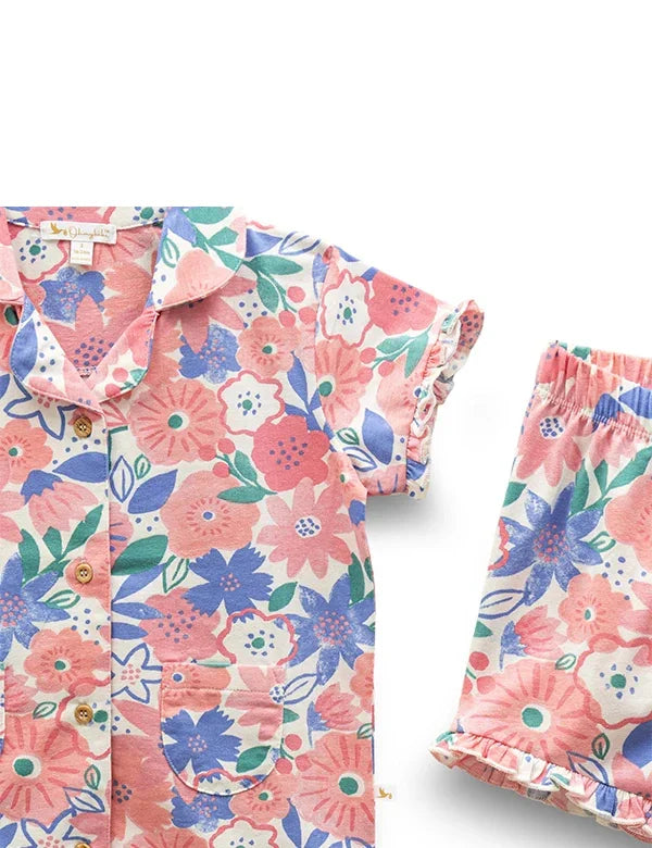 Kids floral print organic cotton pajama set with short sleeves and button-up shirt