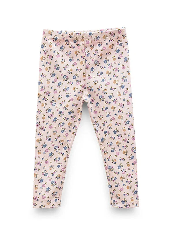 Pink baby leggings with multicolor small floral print, front view on white background