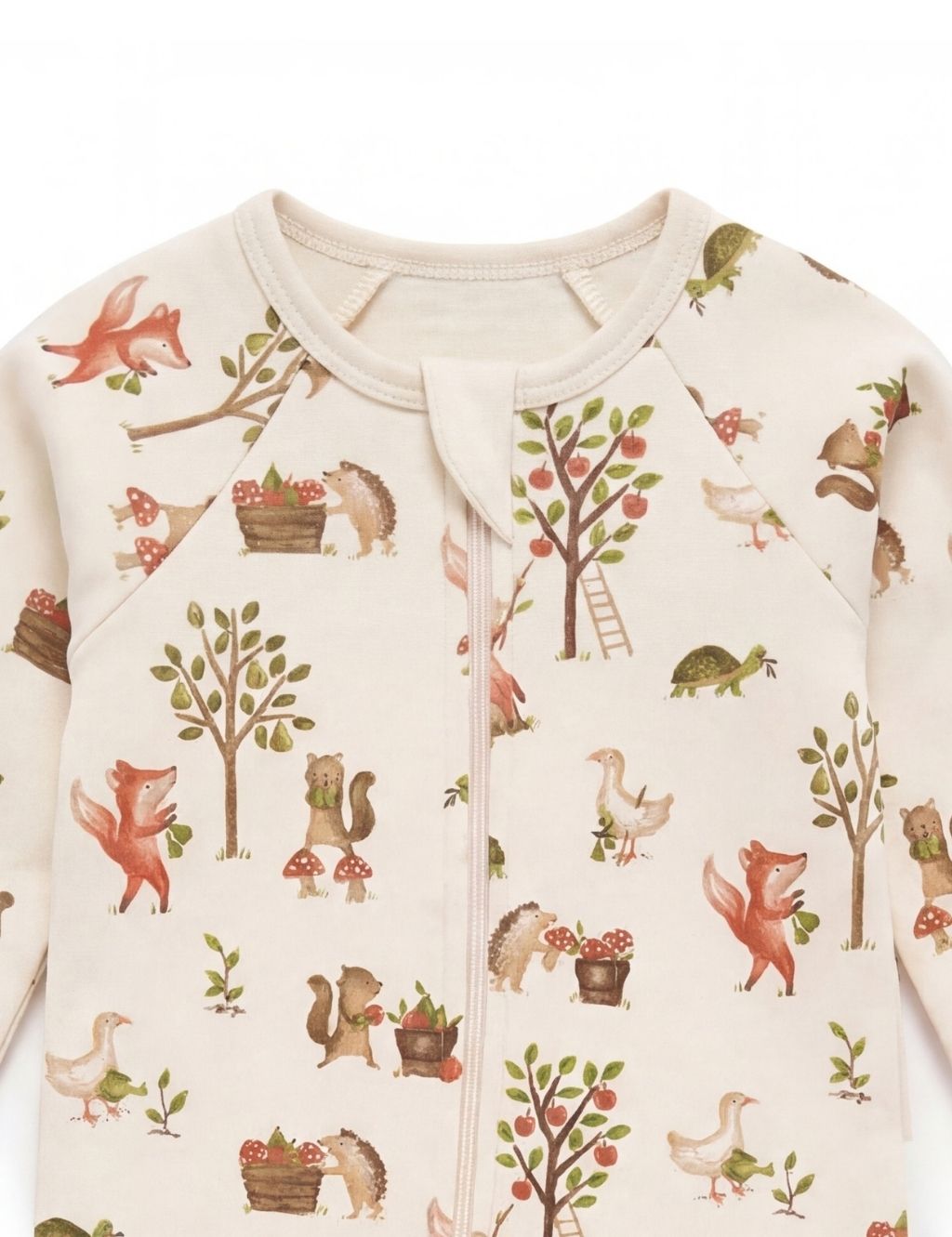 Close-up of the ribbed neckline and fox harvest print detail on this organic cotton romper.