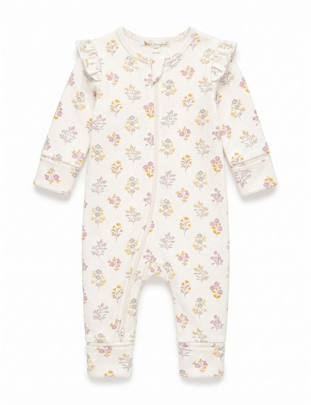 Flatlay of an organic cotton floral print romper featuring long sleeves, shoulder ruffles, and a front zipper closure.