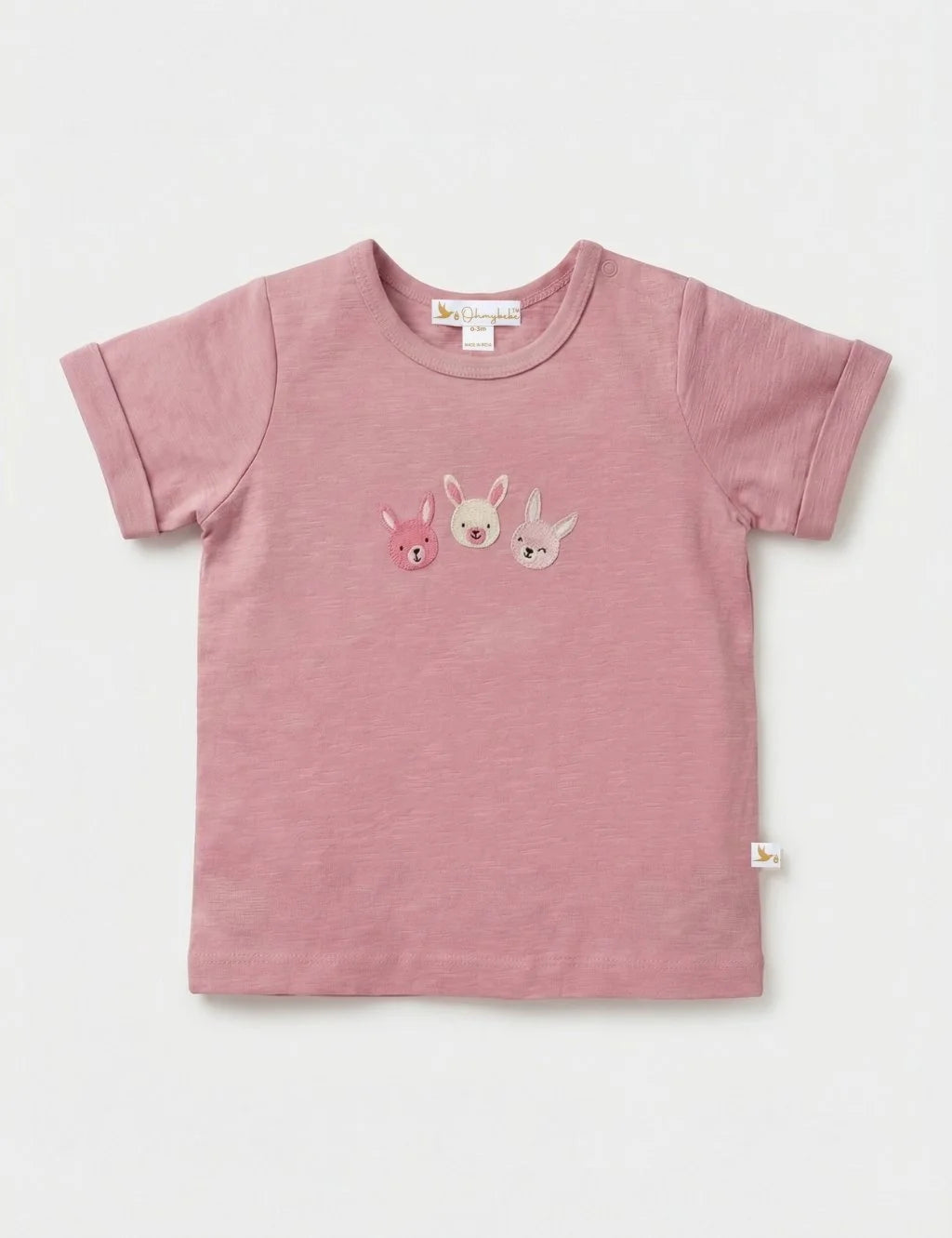Pink organic cotton baby t-shirt featuring three cute bunny faces embroidered on the chest.