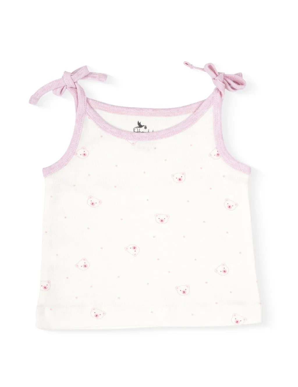 Flatlay of an organic cotton white and pink top featuring a cute bear print and shoulder tie straps