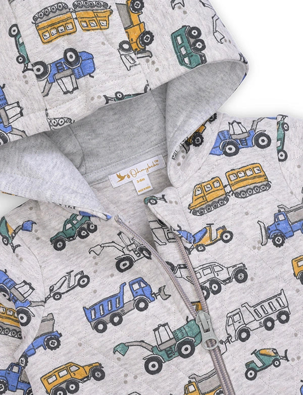 Close-up of gray organic quilted newborn winter romper with hood, zipper, and colorful construction vehicle prints