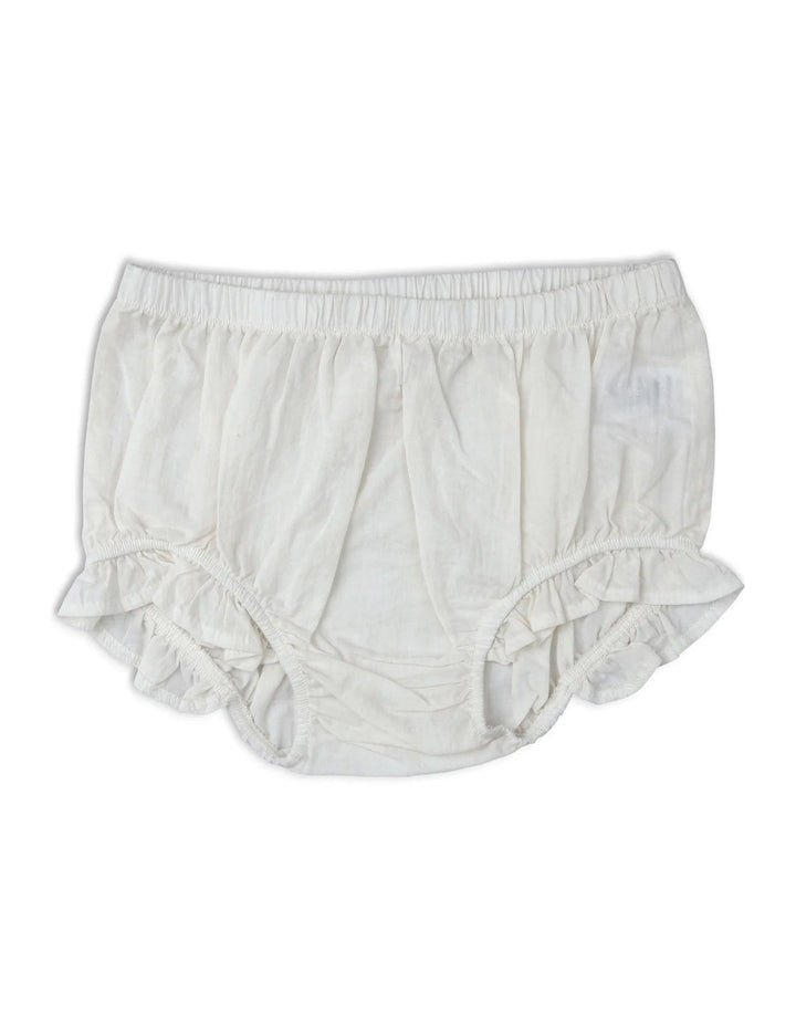 Soft white 100% organic cotton baby bloomers with delicate ruffles around the legs. A comfortable and essential bottom. Shop organic baby bottoms India.