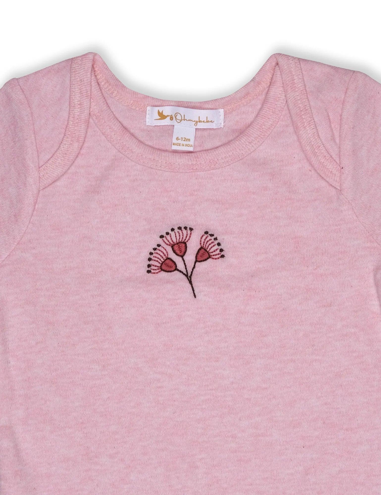 Pink organic cotton baby bodysuit with delicate blossom embroidery, size 6-12 months