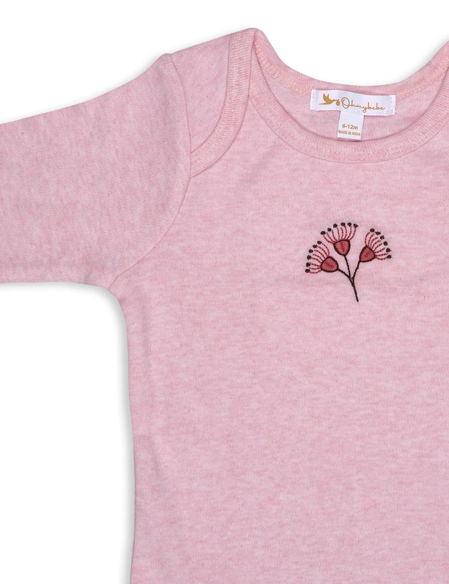 Pink organic cotton baby bodysuit with embroidered floral design, size 6-12 months
