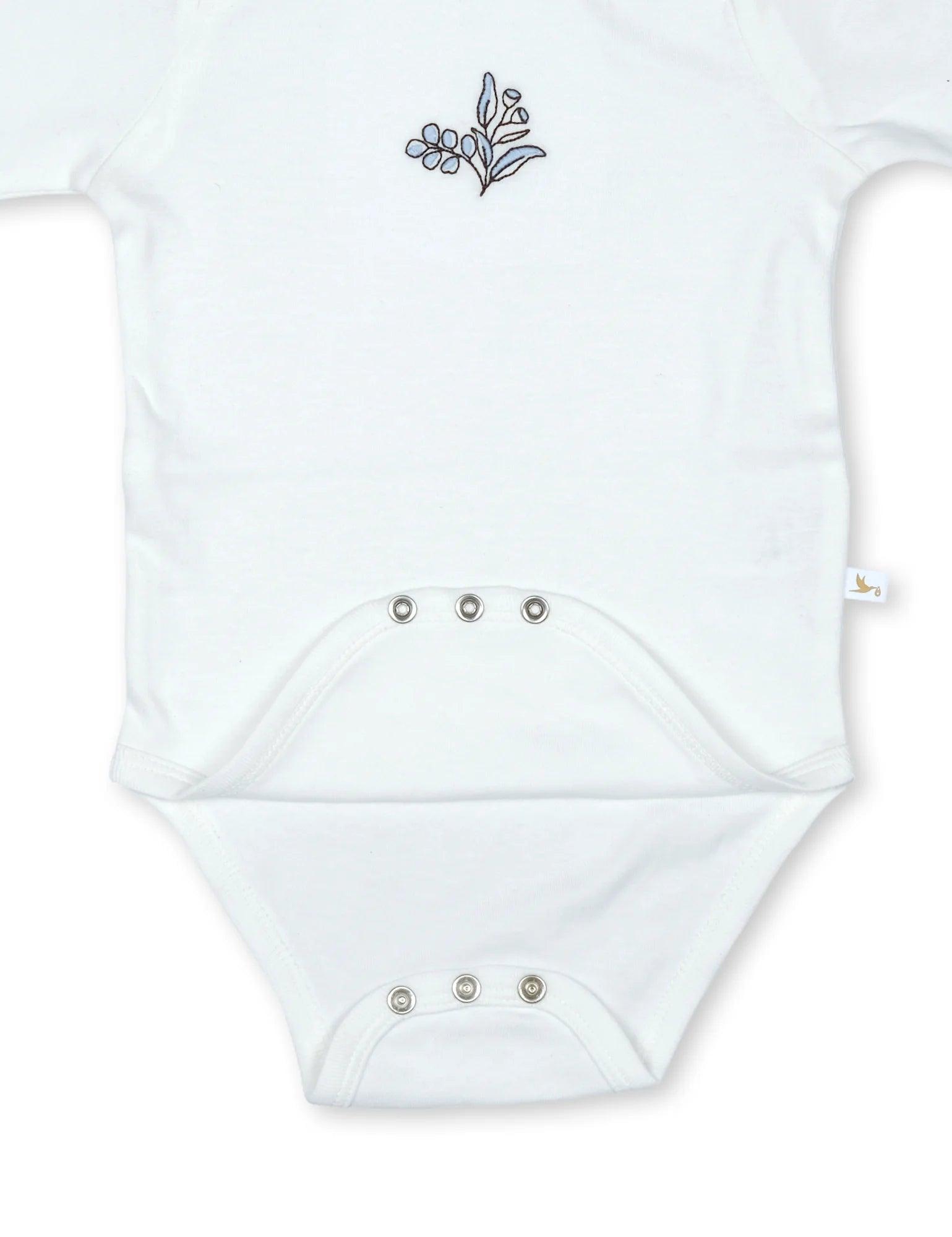 White organic cotton baby bodysuit with snap buttons and blue leaf embroidery