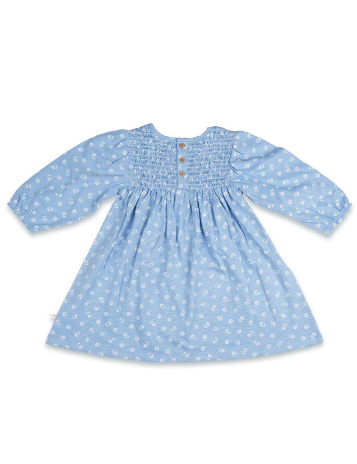 Charming light blue 100% organic cotton baby dress with a delicate white ditsy floral print and smocked bodice. Includes matching bloomers. Buy organic baby sets India.
