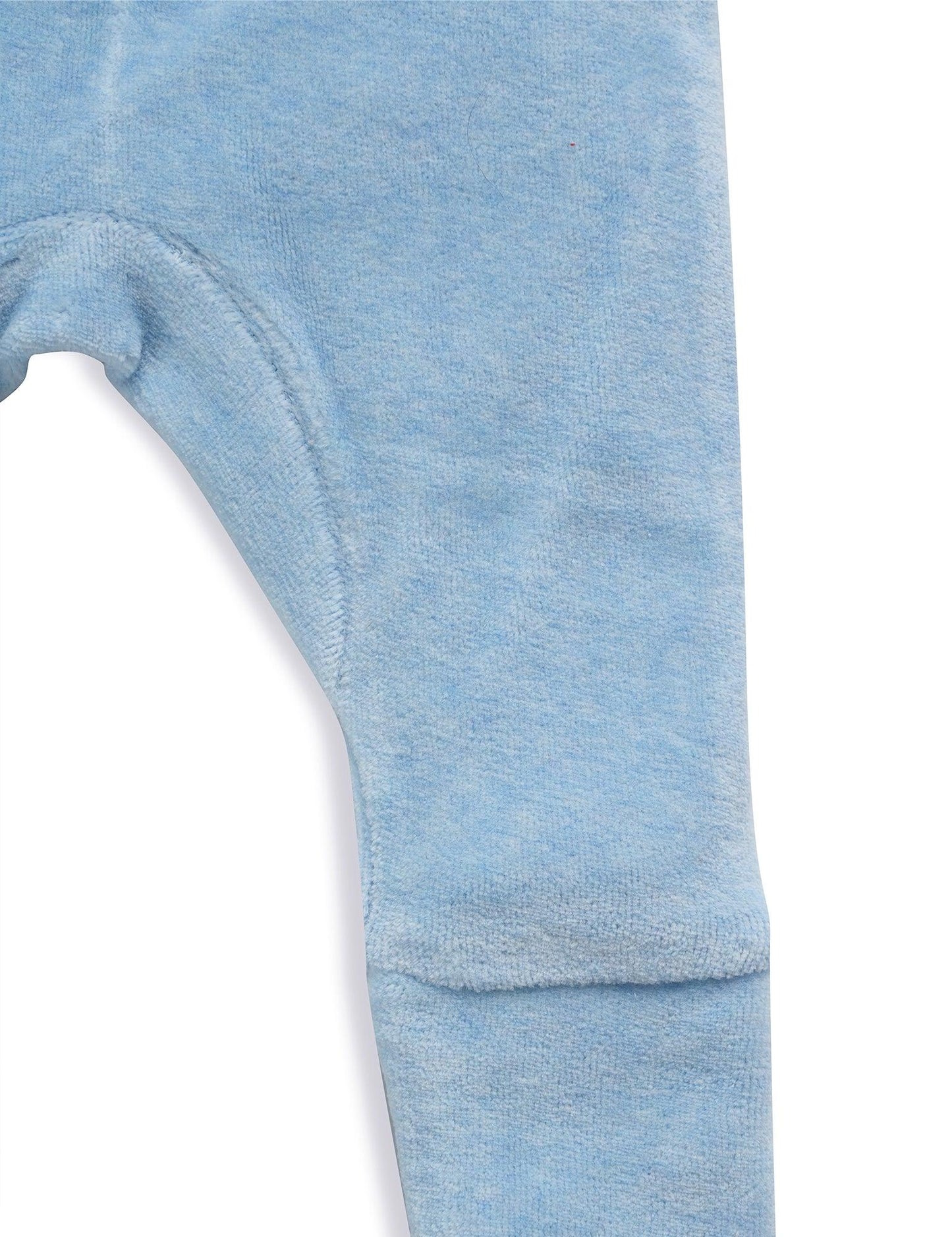 Soft blue organic cotton baby pants with ankle cuffs on white background