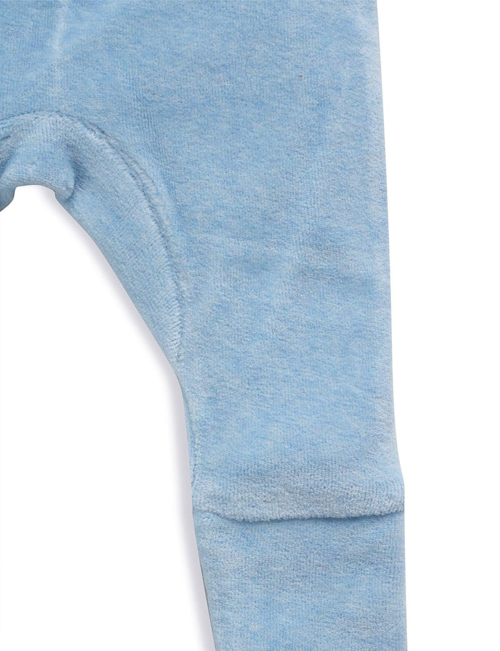 Close-up of the soft blue organic cotton baby pants showing the comfortable cuffed ankle detail. Shop practical baby clothing India.
