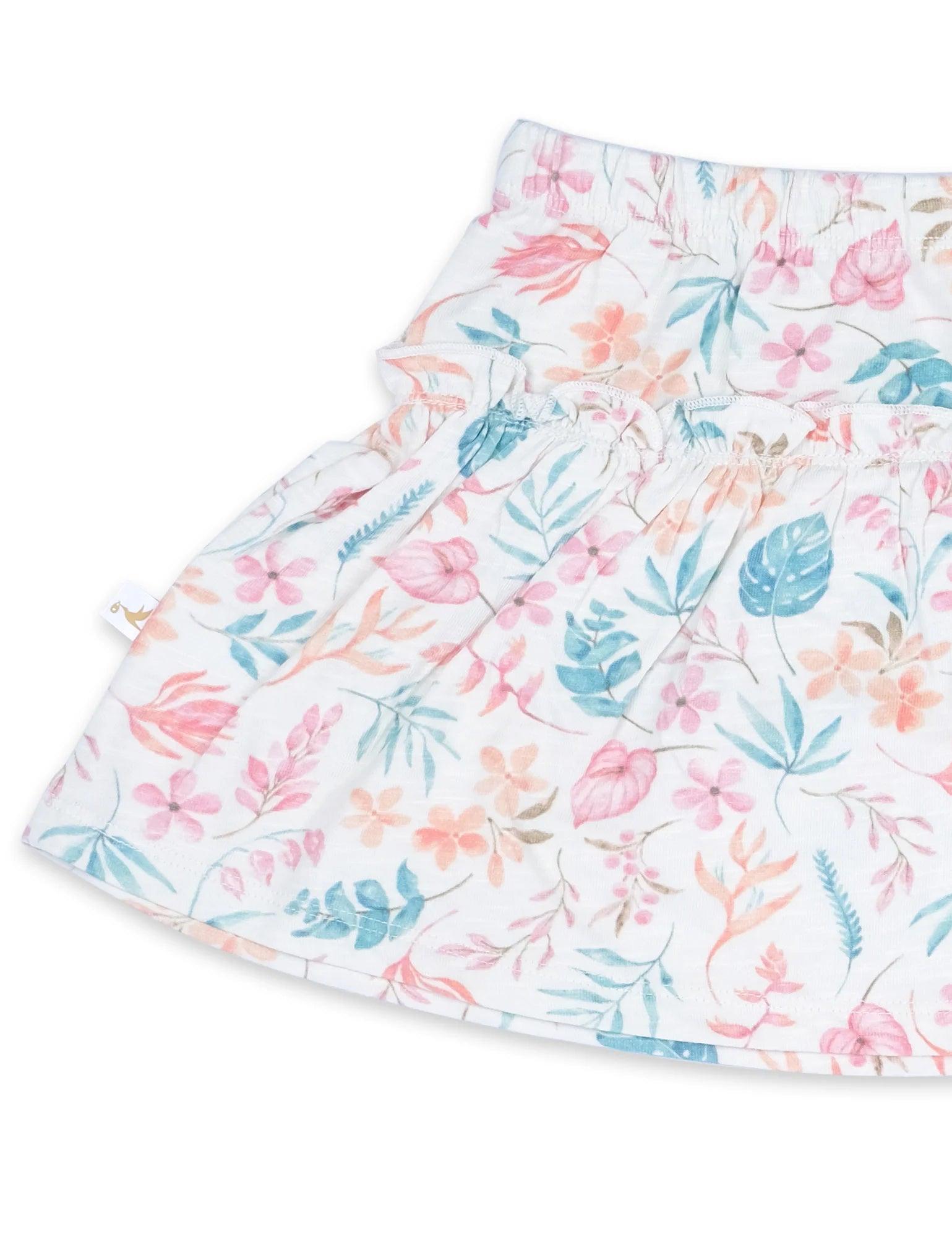 Organic cotton baby skirt with pastel floral print in pink, blue, and peach colors