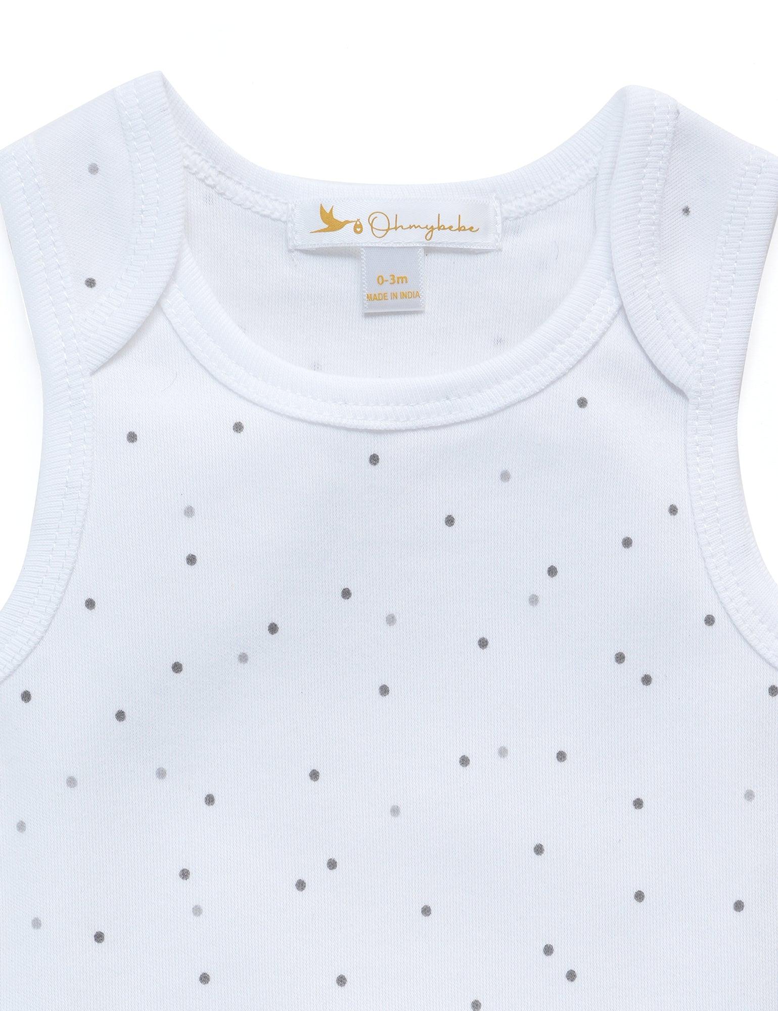 White baby tank top with gray polka dots and Ohmybabe neck label, size 0-3 months