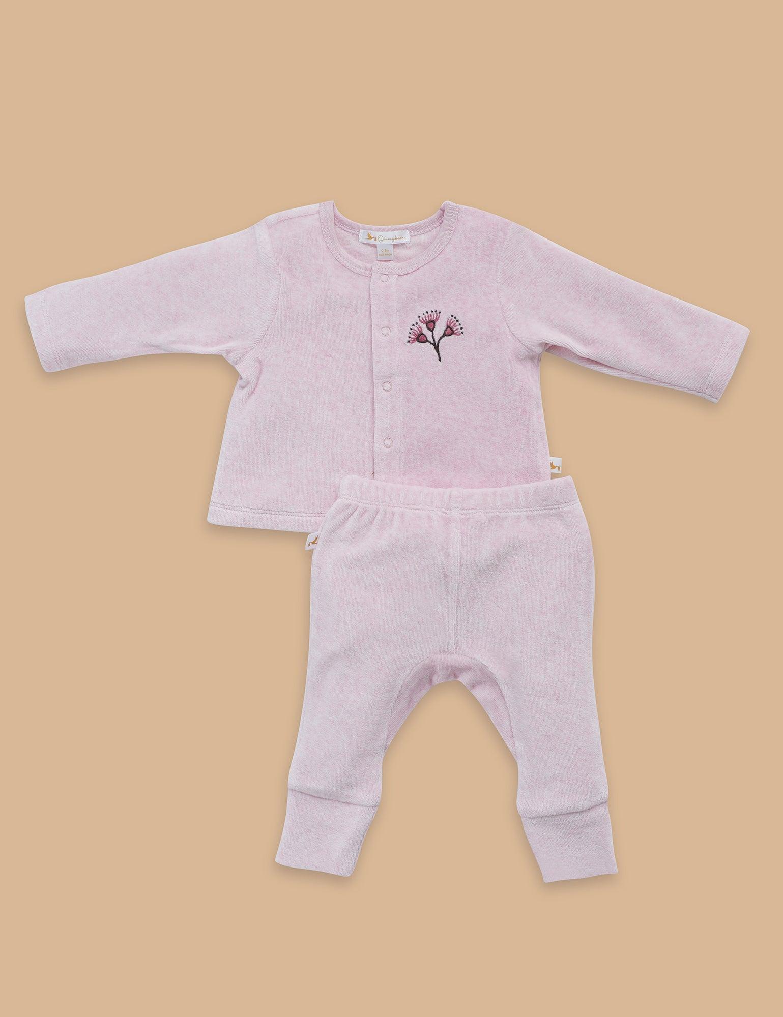 Soft pink organic cotton baby cardigan and pants set with floral embroidery on chest, flatlay
