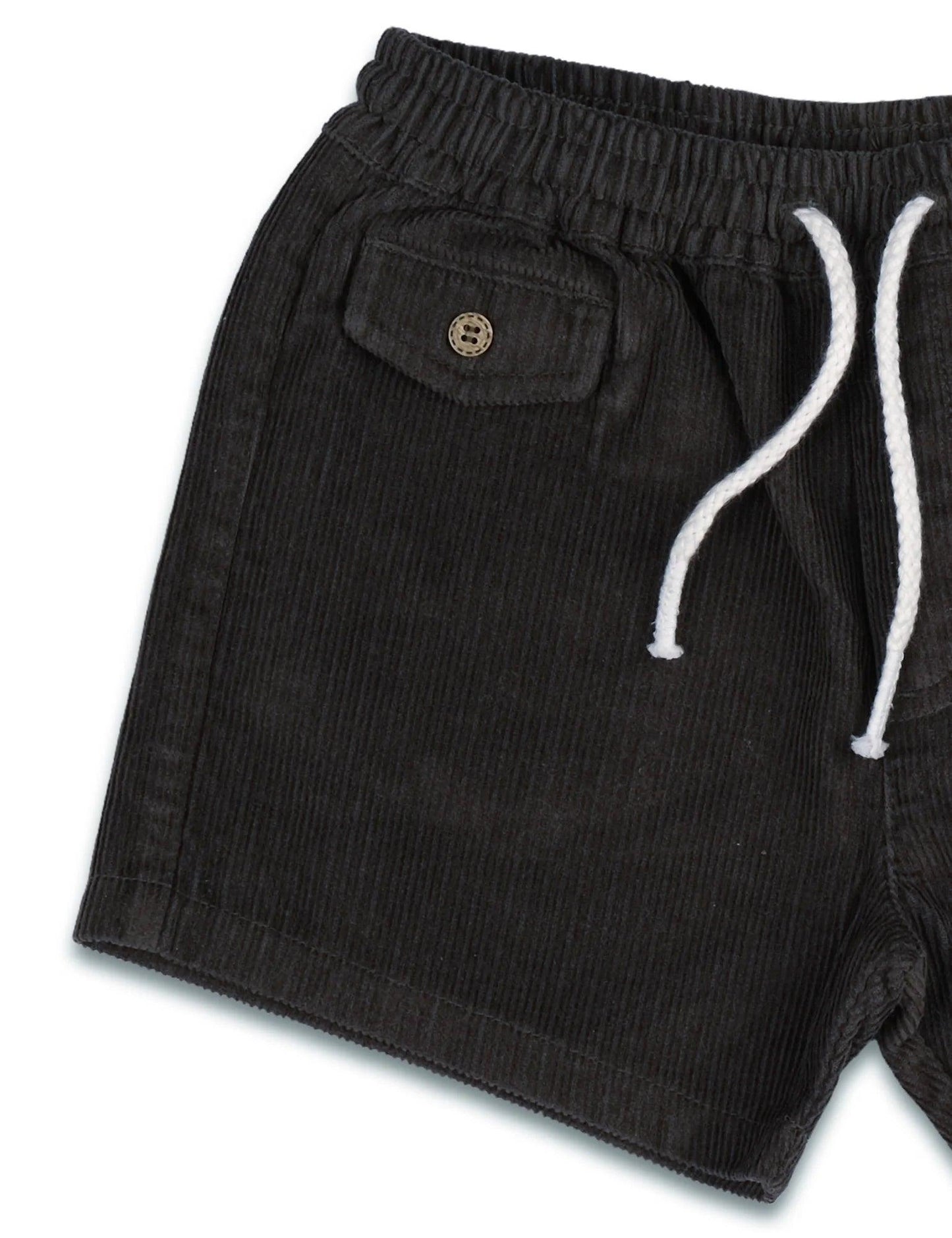 Black organic cotton corduroy shorts with elastic waistband, white drawstring, and buttoned pocket