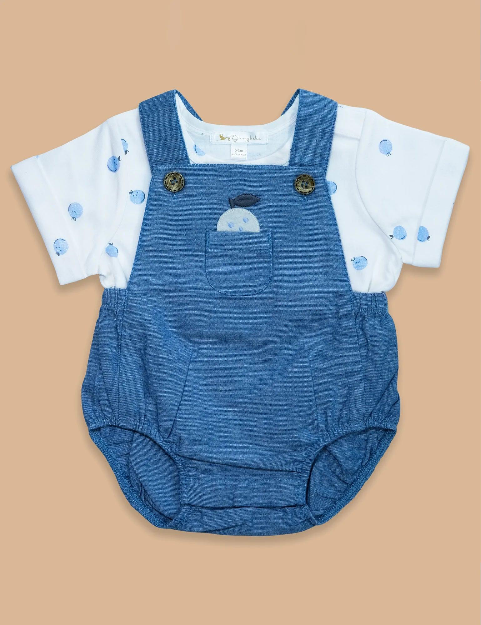 Organic cotton baby dungaree set with blue overalls featuring apple design and white apple print t-shirt