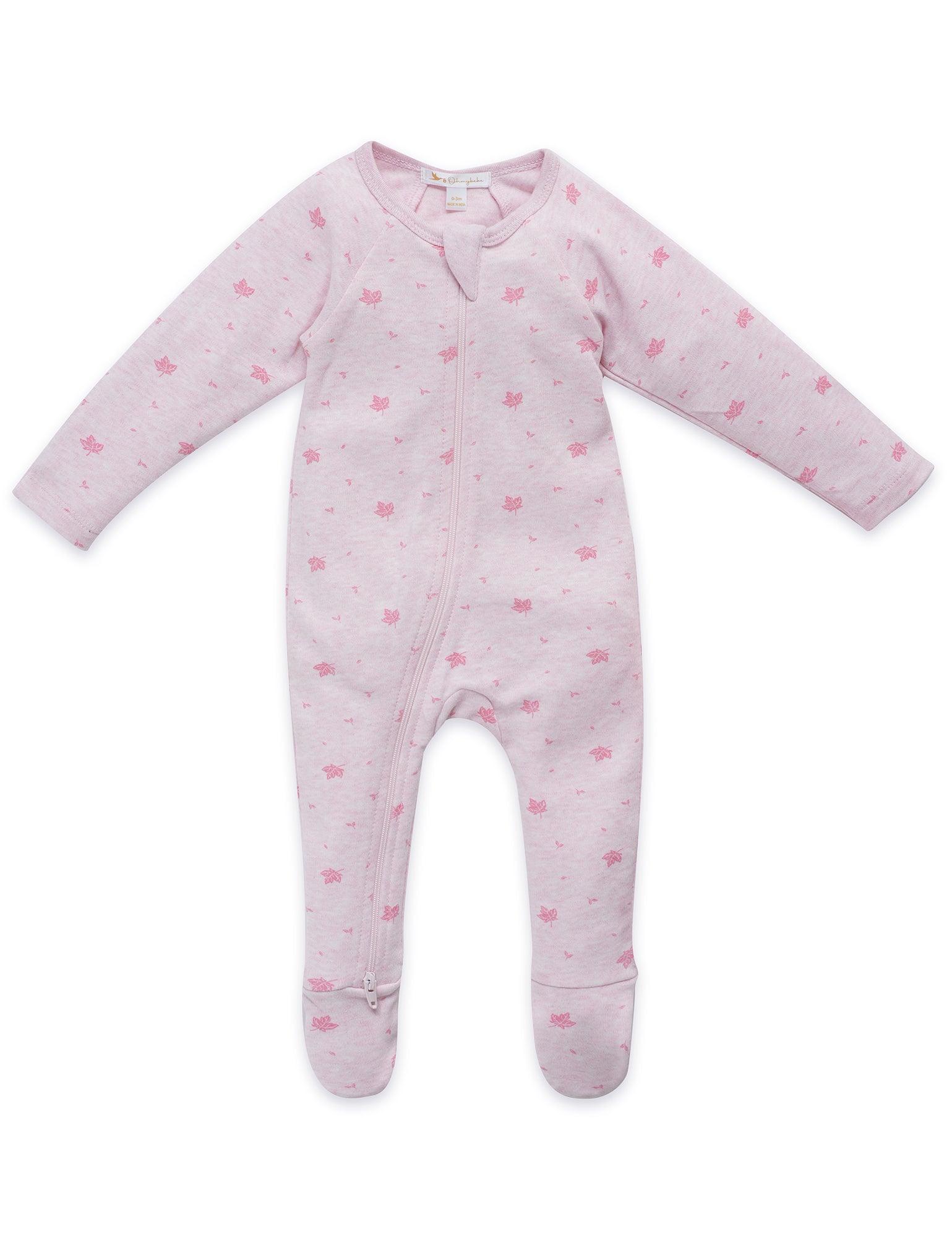 Pink organic cotton footed baby pajamas with long sleeves and leaf pattern